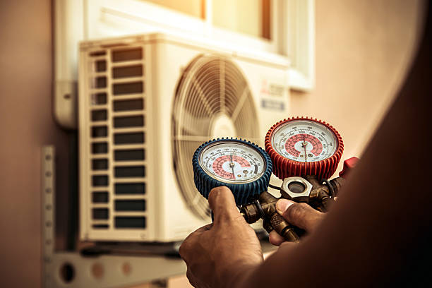 Professional Ductwork Repair technician working in Mount Olive, AL